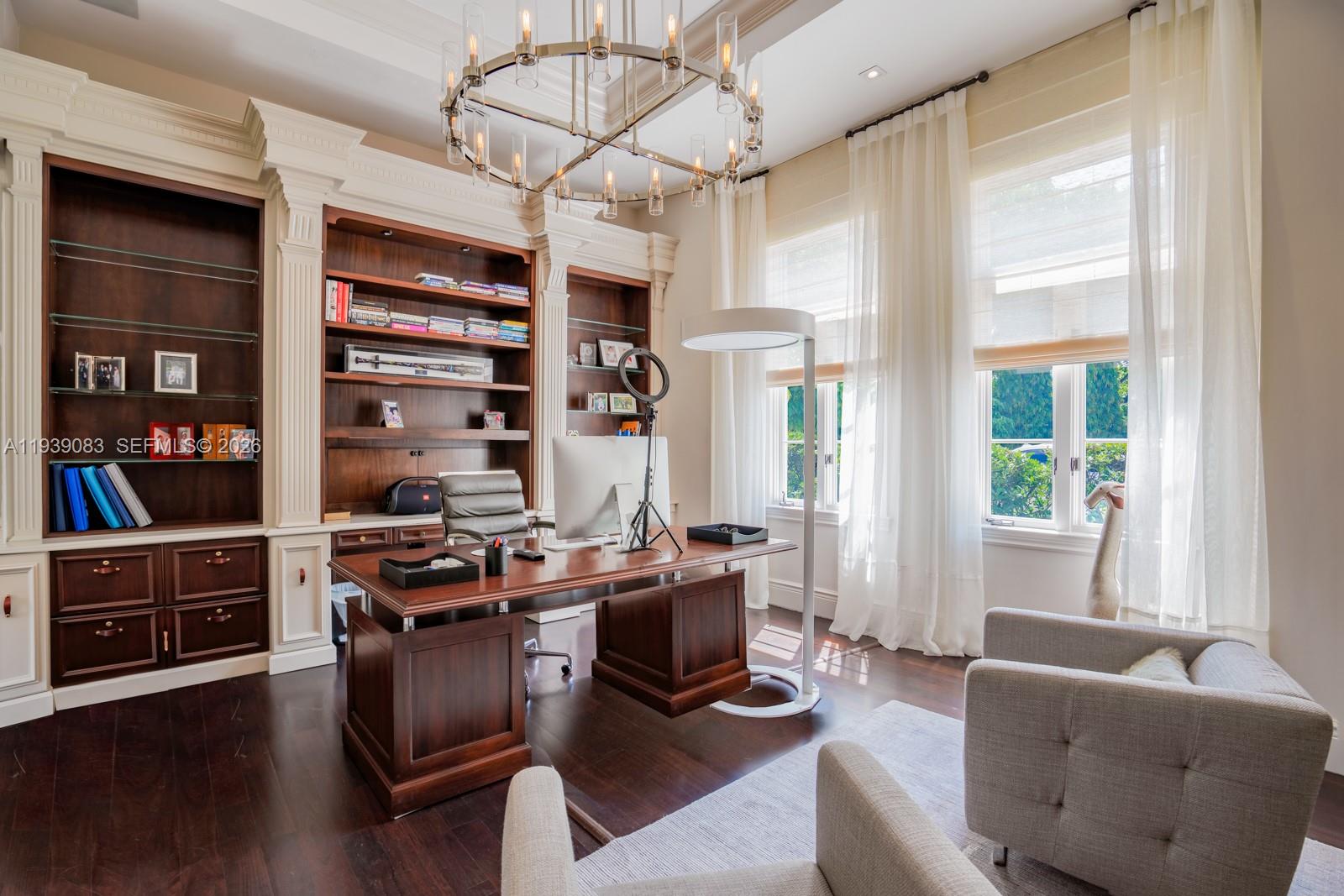 7275 Old Cutler Road Coral Gables, FL 33143 - Photo 11 of 21 a view of a livingroom with workspace and a window