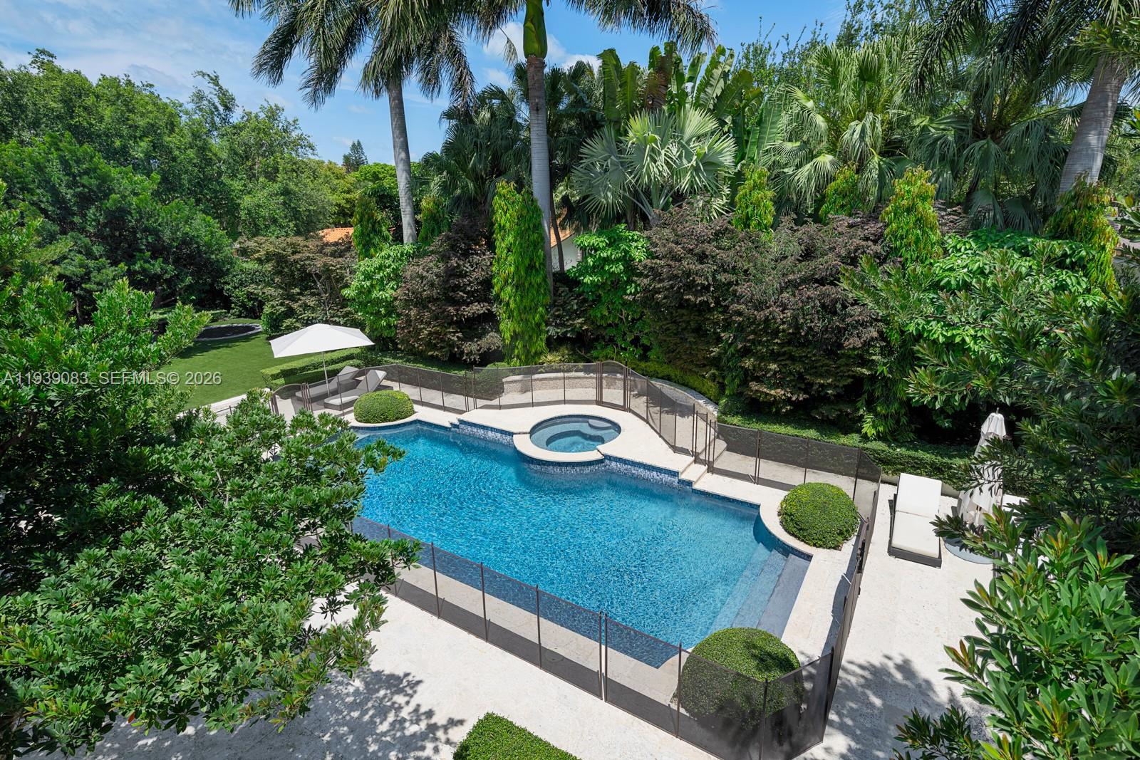 7275 Old Cutler Road Coral Gables, FL 33143 - Photo 14 of 21 an aerial view of a house with swimming pool garden view and trees