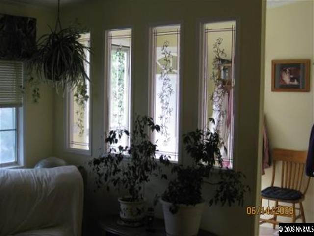5178 Anchorage Court Reno, NV 89506 - Photo 5 of 9 a living room with furniture and a potted plant