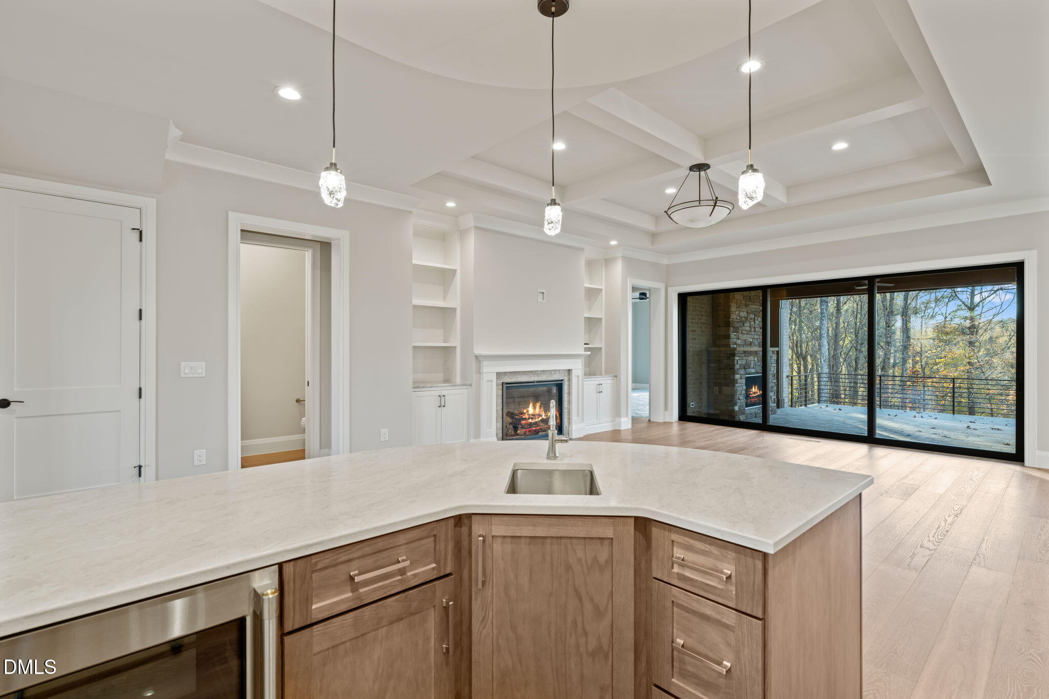 9125 Overlook Crest Drive Wake Forest, NC 27587 - Photo 12 of 54 a open kitchen with a sink and chandelier