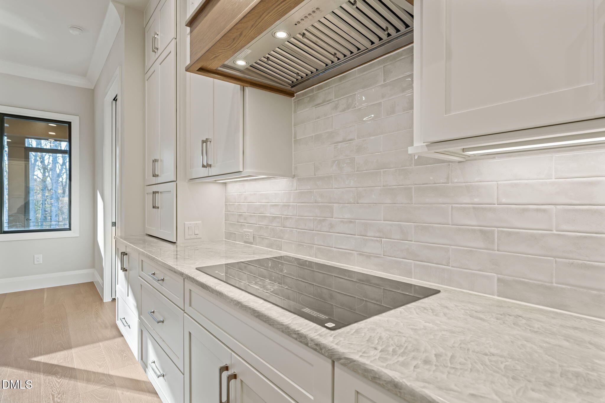 9125 Overlook Crest Drive Wake Forest, NC 27587 - Photo 23 of 54 a view of a kitchen counter space with windows