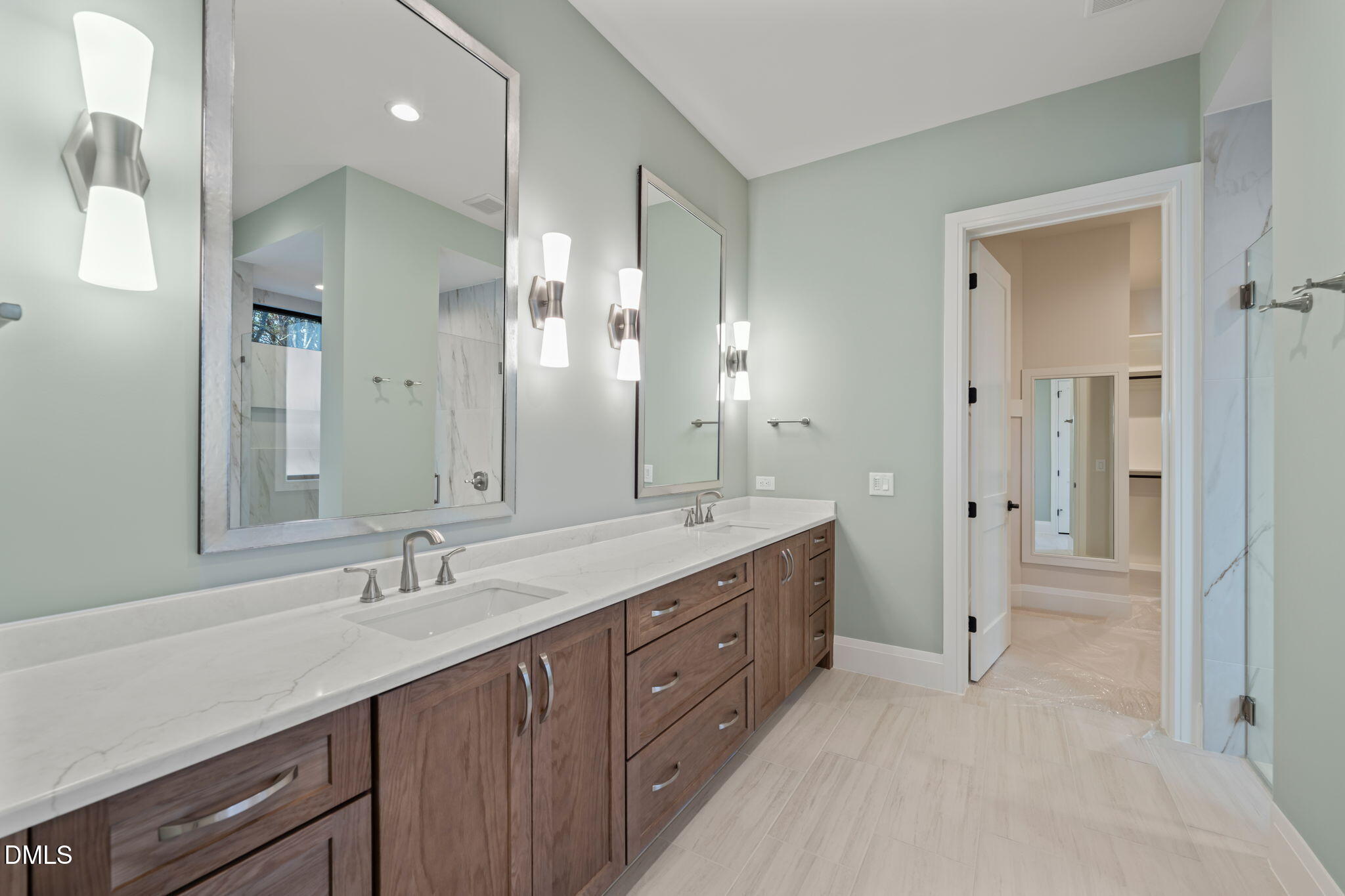 9125 Overlook Crest Drive Wake Forest, NC 27587 - Photo 31 of 54 a spacious bathroom with a double vanity sink mirror and double