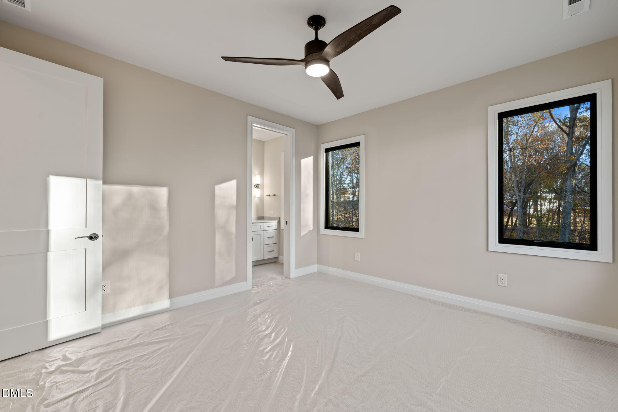 9125 Overlook Crest Drive Wake Forest, NC 27587 - Photo 41 of 54 a view of empty room with window and ceiling fan