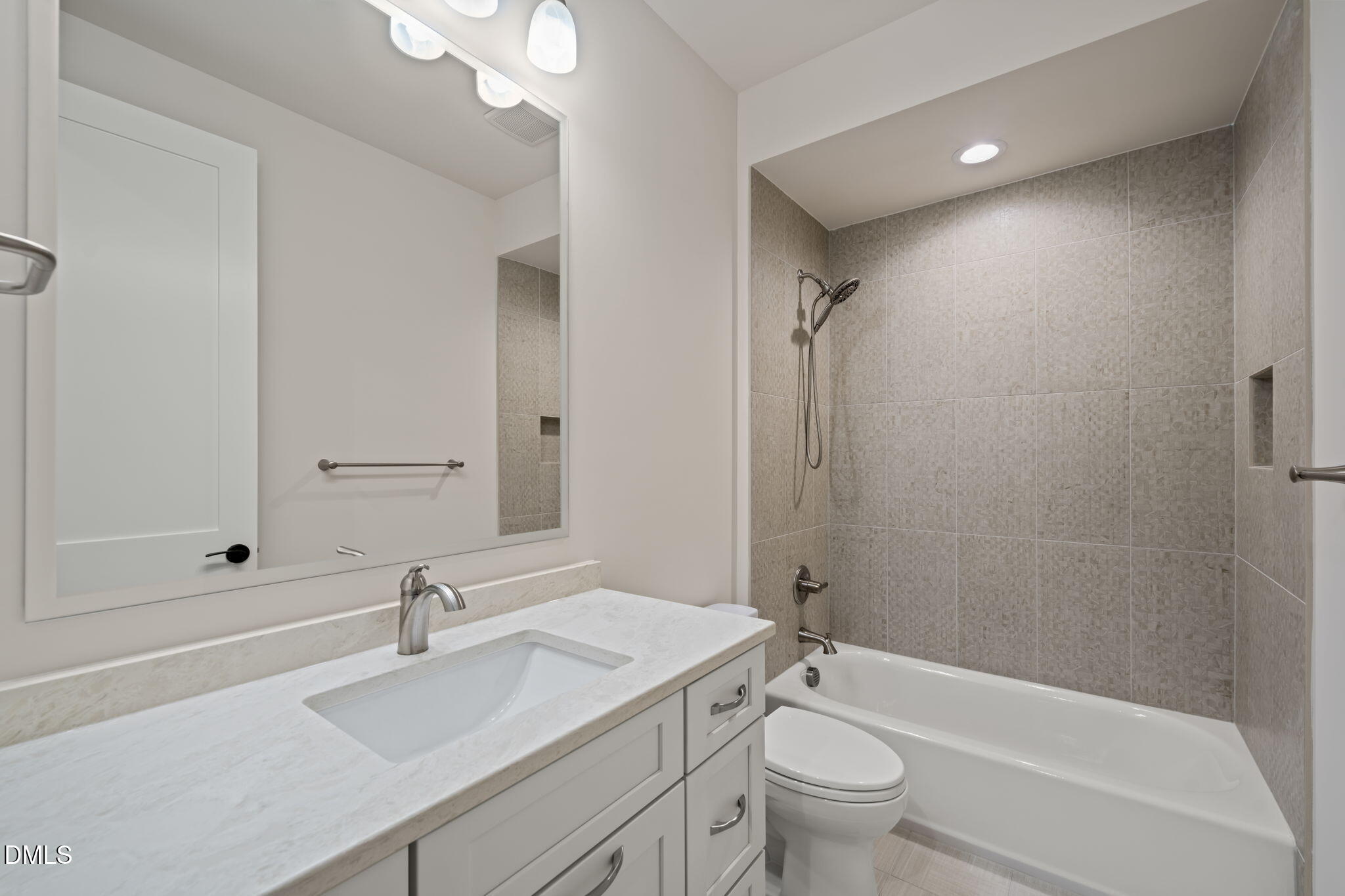 9125 Overlook Crest Drive Wake Forest, NC 27587 - Photo 46 of 54 a bathroom with a sink a toilet and shower