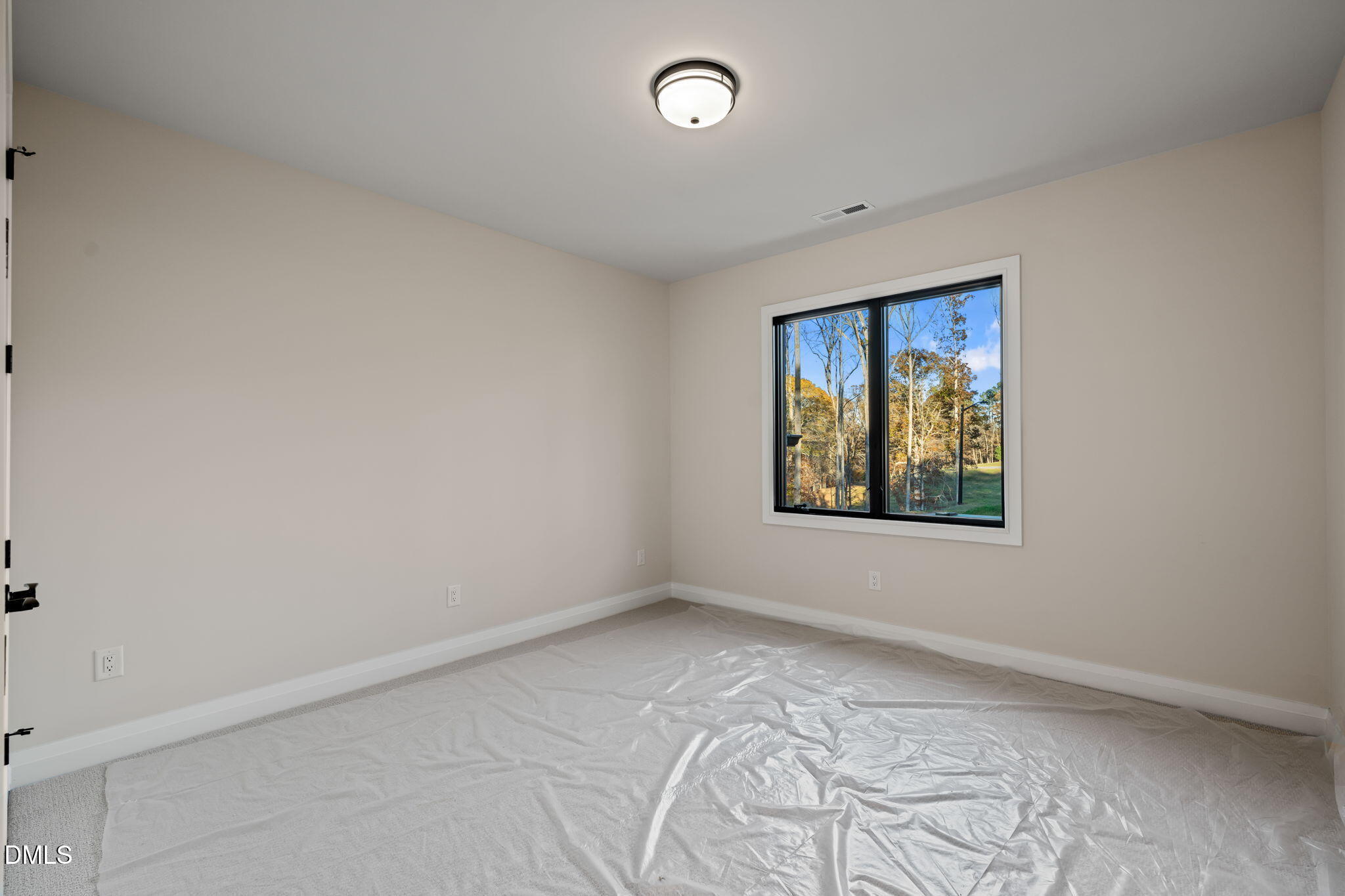 9125 Overlook Crest Drive Wake Forest, NC 27587 - Photo 47 of 54 an empty room with windows