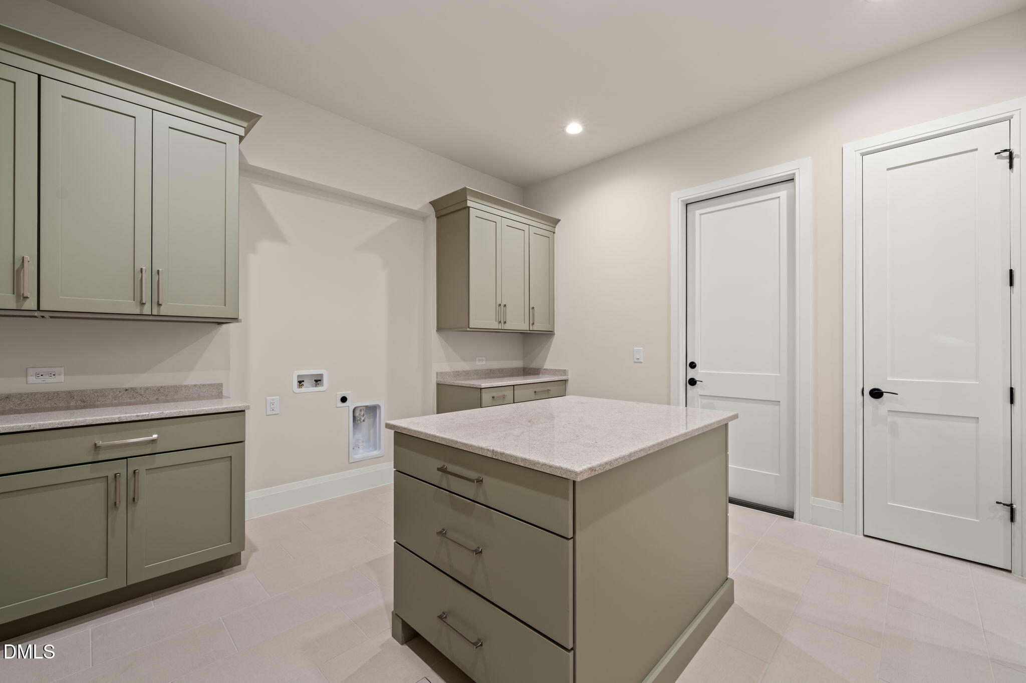 9125 Overlook Crest Drive Wake Forest, NC 27587 - Photo 50 of 54 a utility room with cabinets washer and dryer