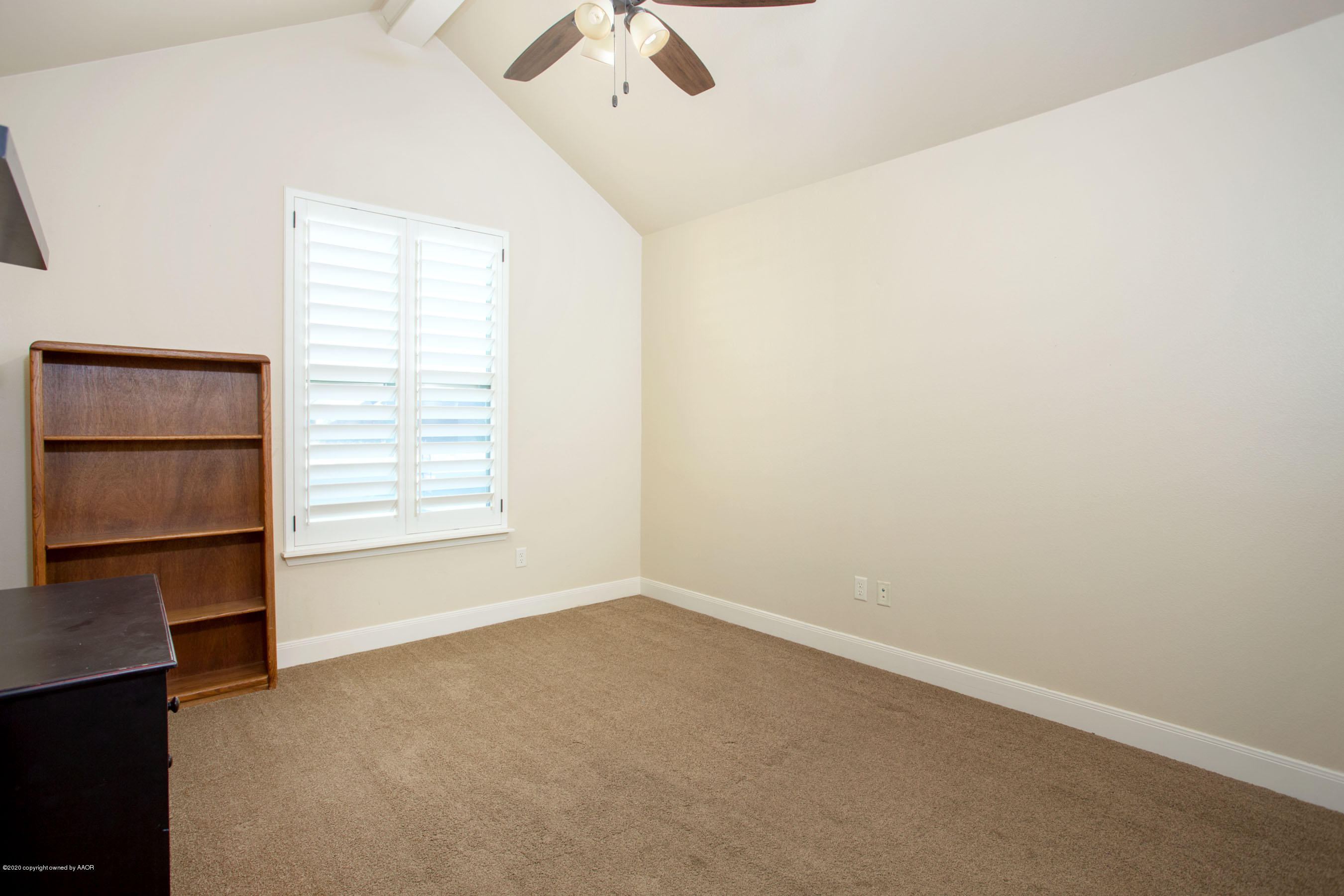 3917 Arden Road Amarillo, TX 79118 - Photo 11 of 17 an empty room with a window