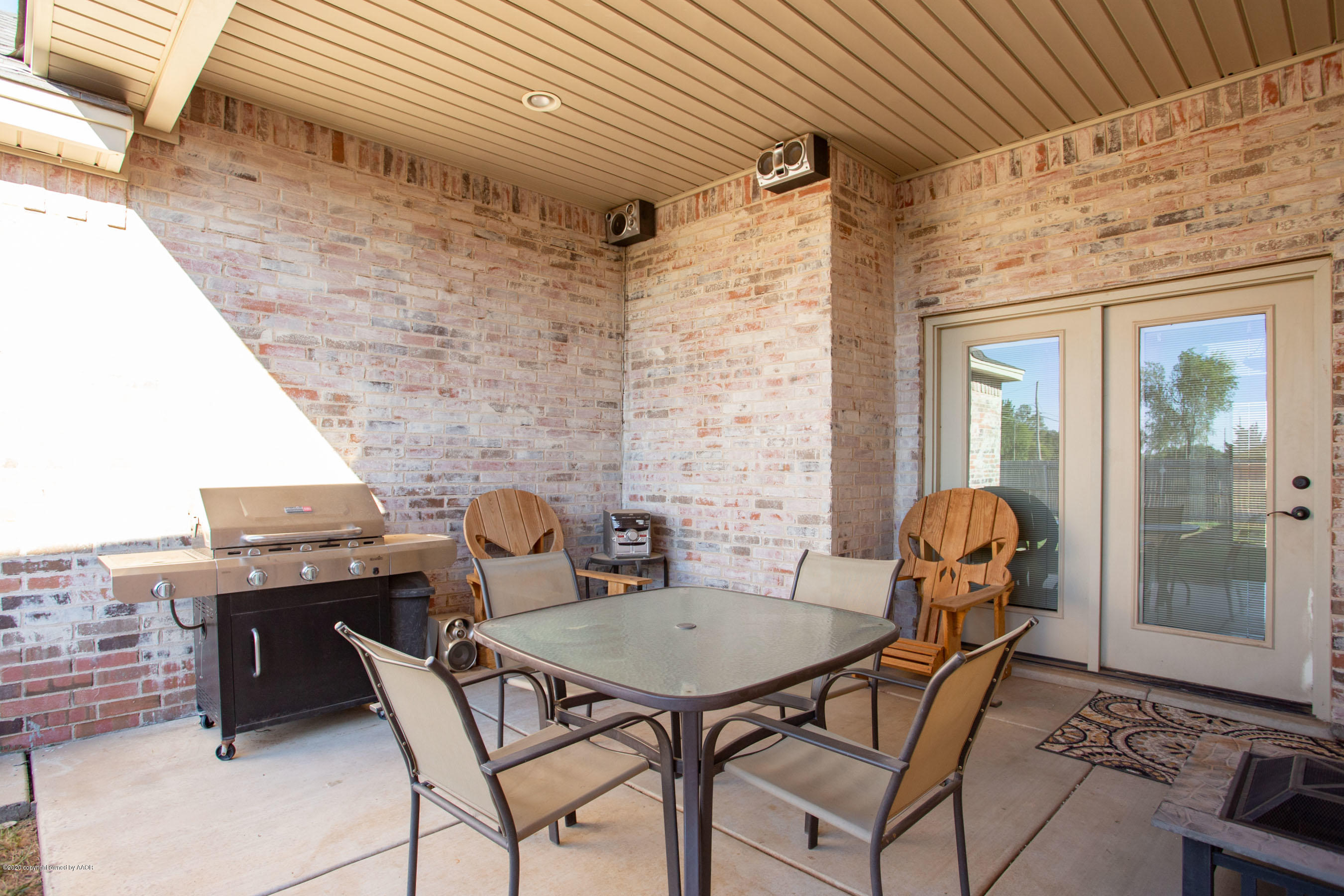 3917 Arden Road Amarillo, TX 79118 - Photo 14 of 17 a patio with table and chairs