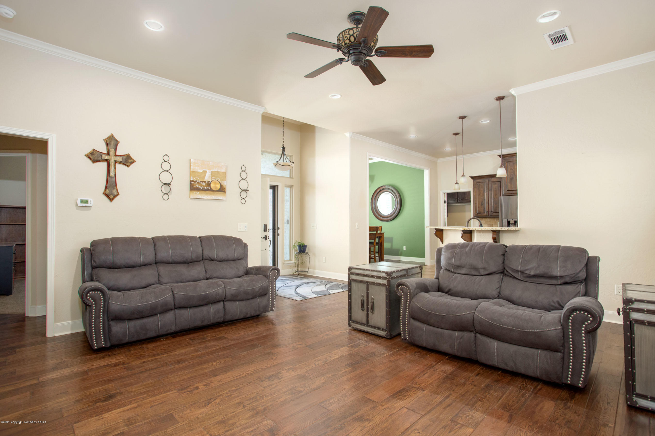 3917 Arden Road Amarillo, TX 79118 - Photo 4 of 17 a living room with furniture and a wooden floor