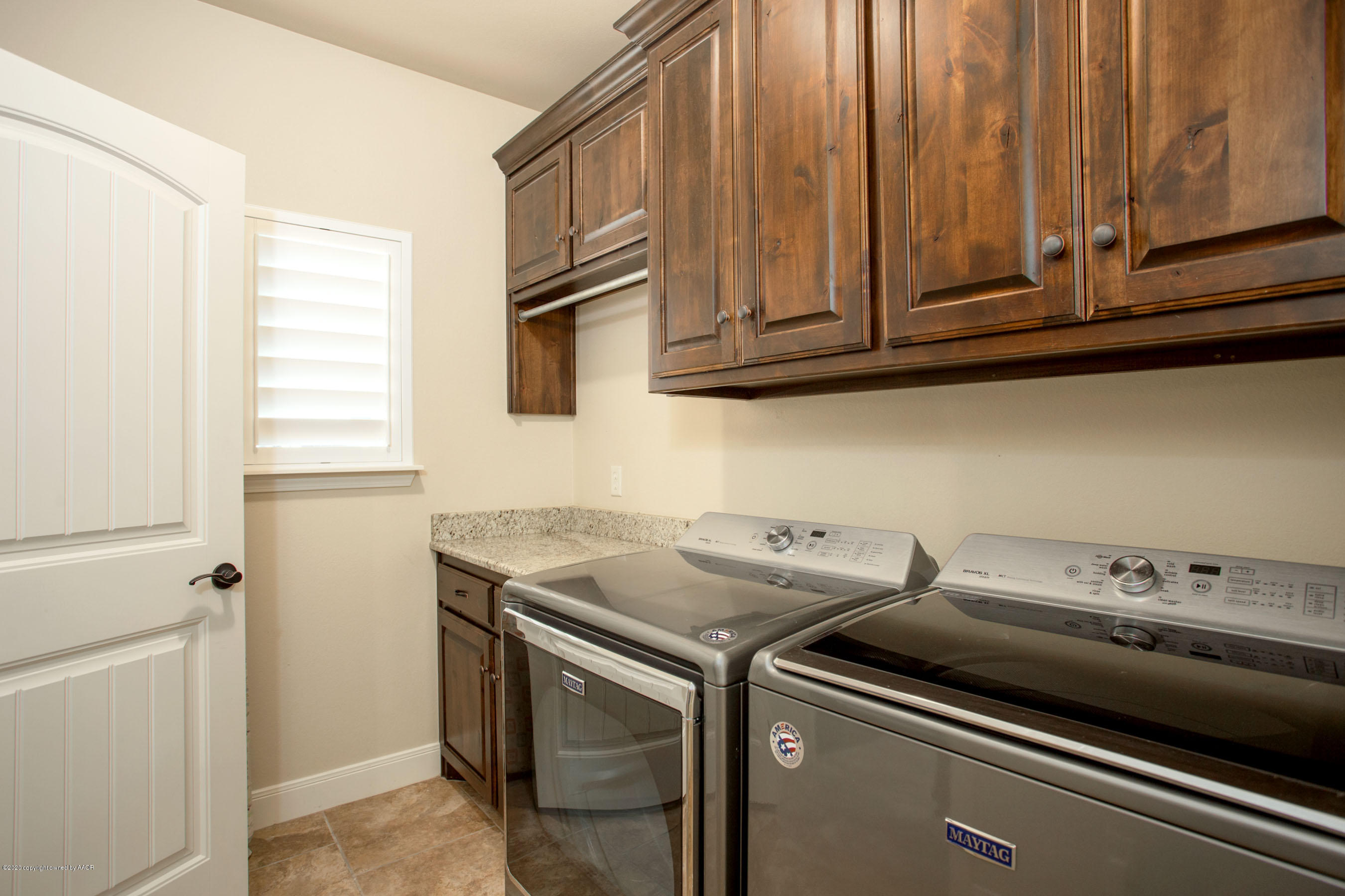3917 Arden Road Amarillo, TX 79118 - Photo 7 of 17 a utility room with dryer and washer