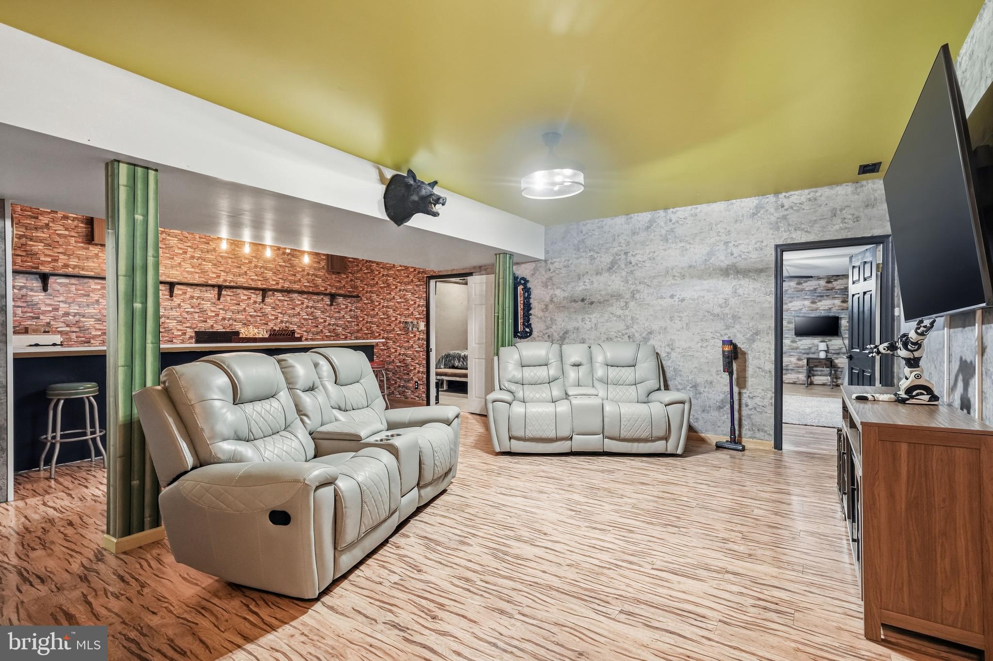 705 Garden Road Pittsgrove, NJ 08318 - Photo 43 of 72 a living room with furniture and a flat screen tv