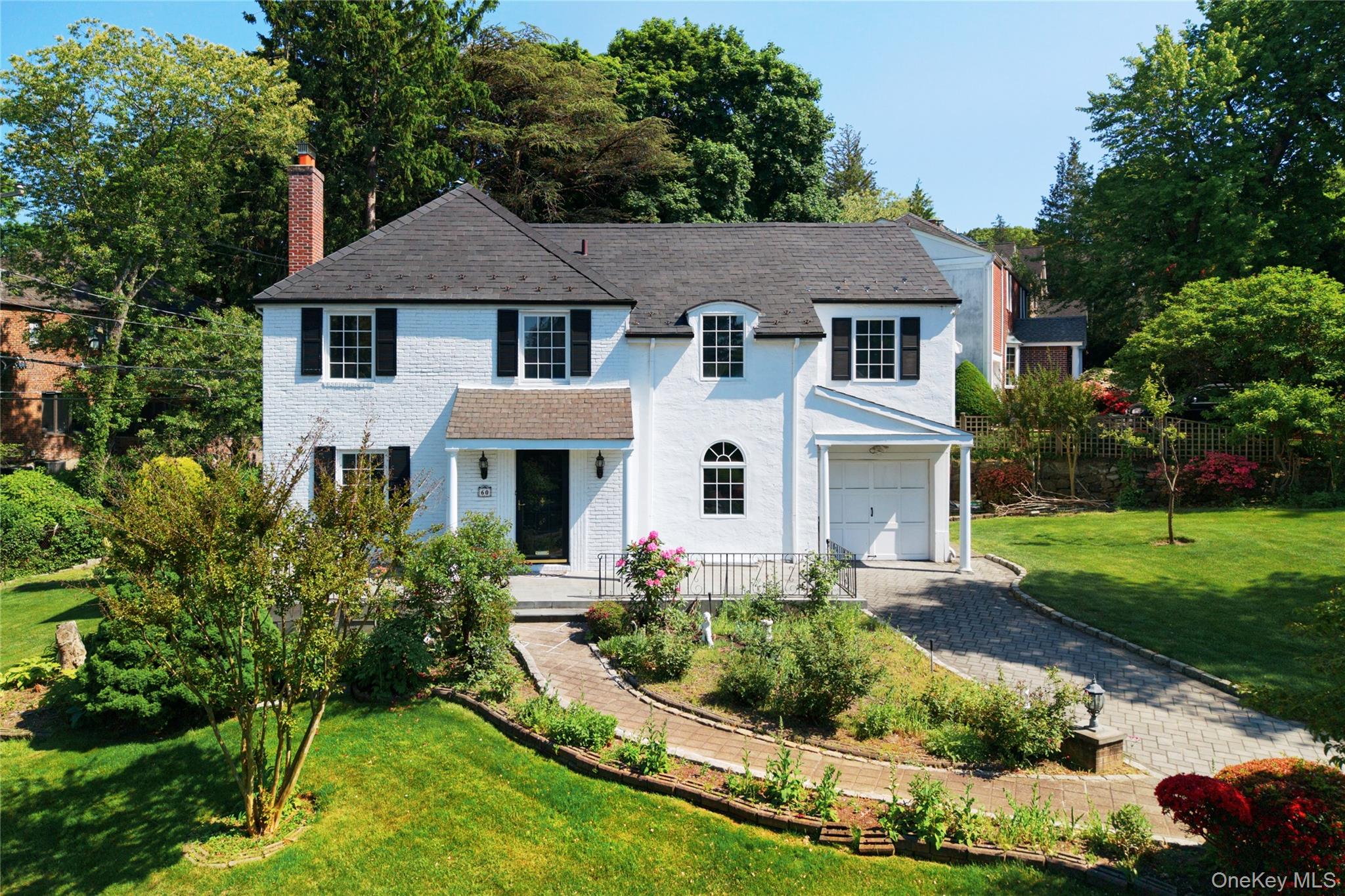 60 Mill Spring Road Manhasset, NY 11030 - Photo 1 of 18 a aerial view of a house