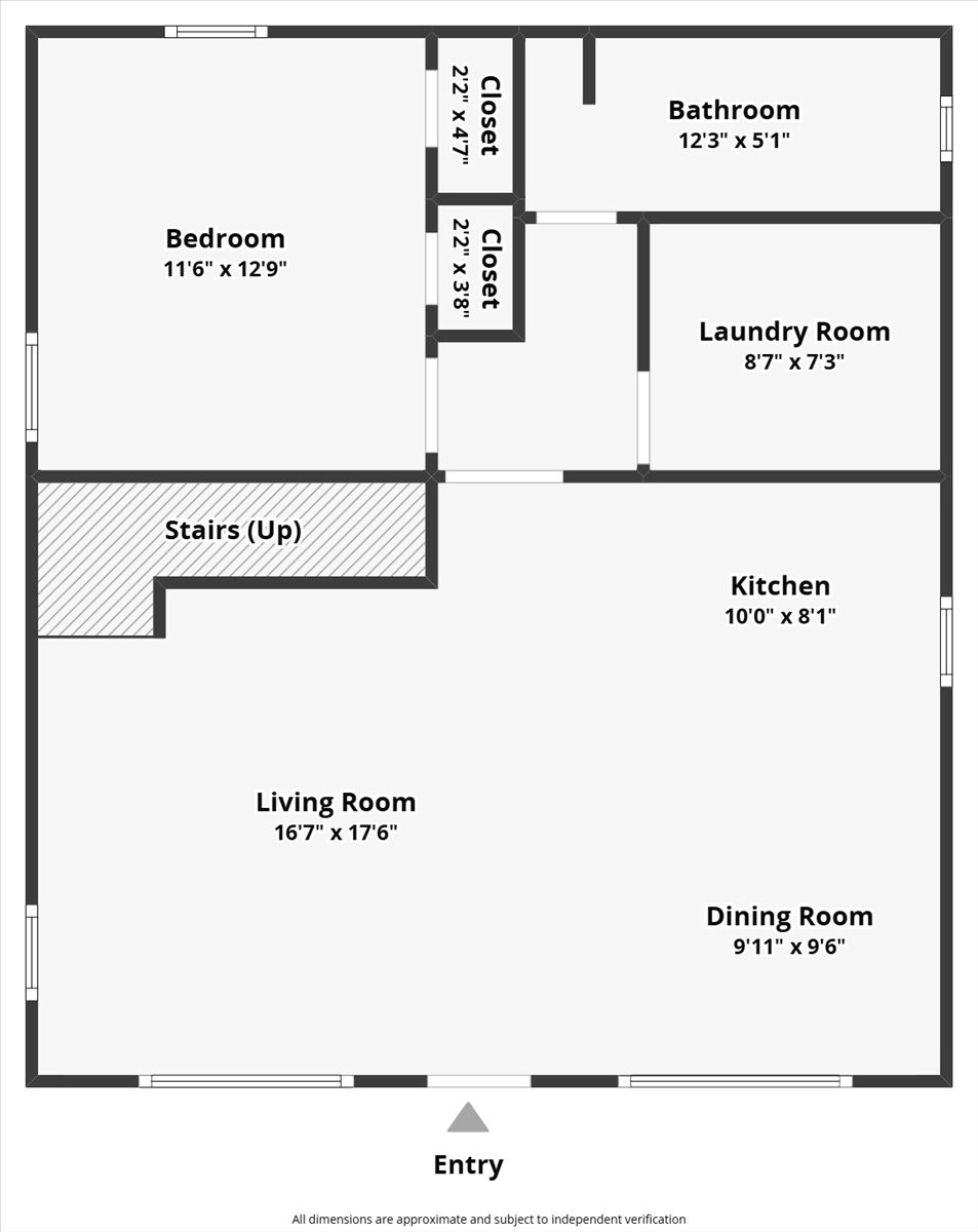 130 Beachcomber Avenue Surfside Beach, TX 77541 - Photo 33 of 33 This floor plan features a spacious living room, a dining room, and a kitchen. It includes one bedroom with two closets, a bathroom, and a laundry room. The entryway leads to stairs going up.