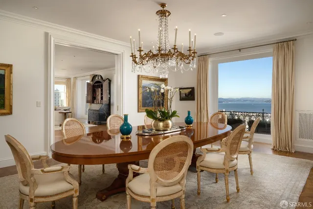 a kitchen with stainless steel appliances a sink stove and cabinets