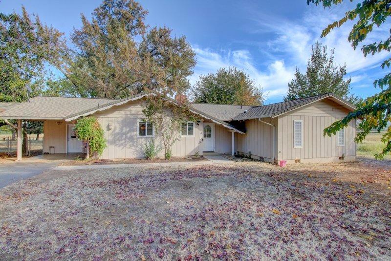 1658 Old Stage Road Central Point, OR 97502 - Photo 1 of 1 a view of a house with a yard and large tree