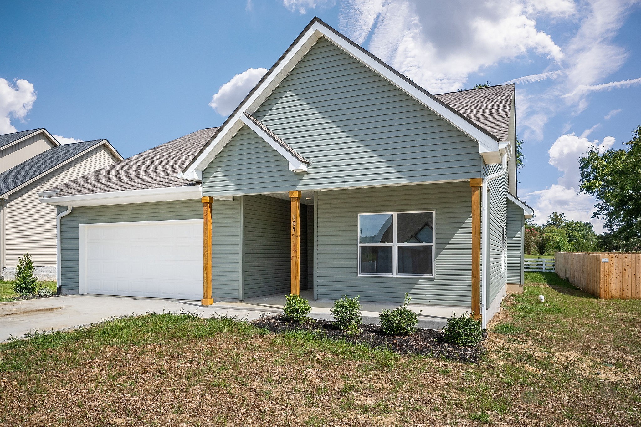 105 Reece Road Baxter, TN 38544 - Photo 28 of 33 a front view of a house with garden