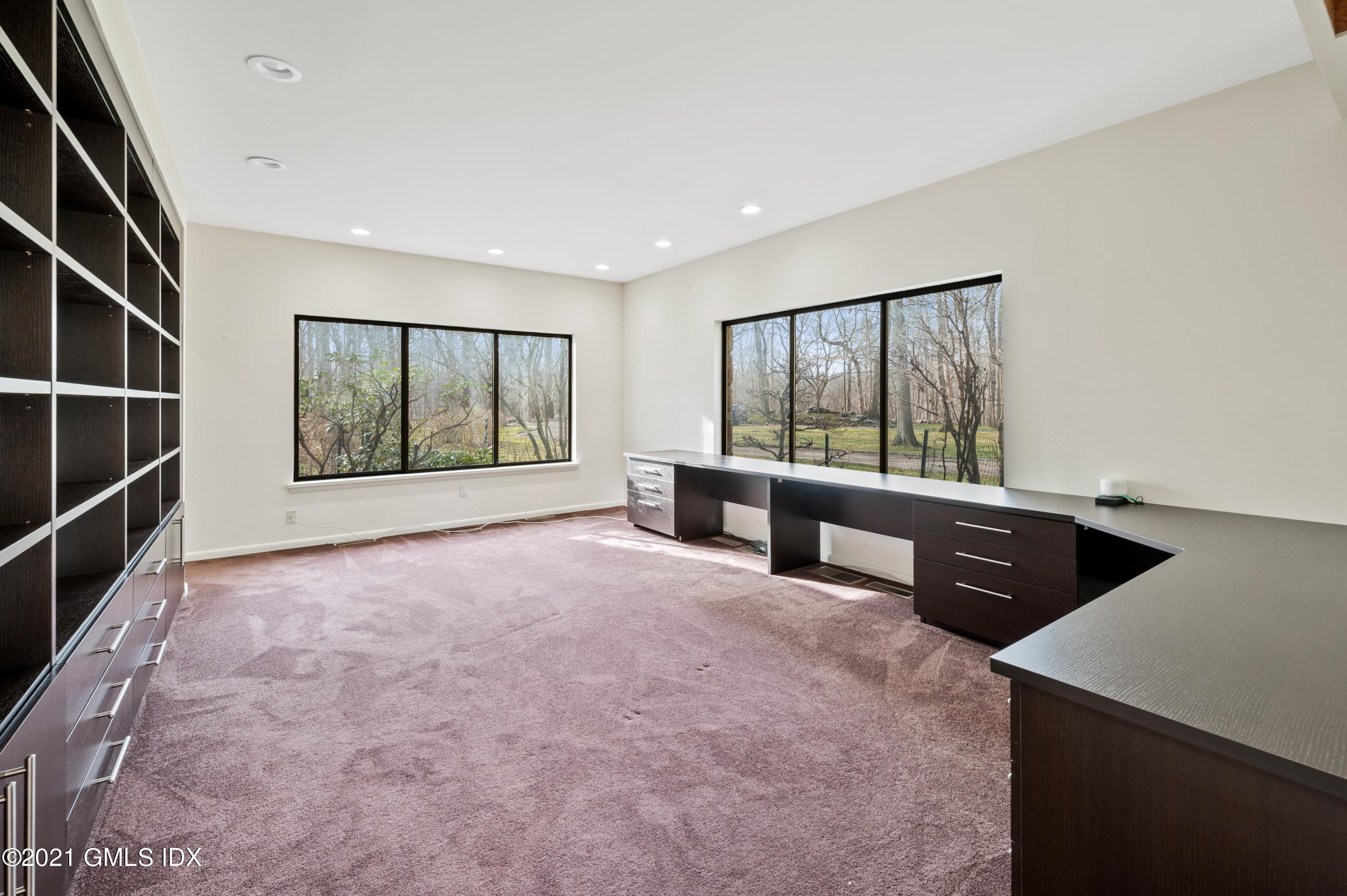 39 Cliffdale Road Greenwich, CT 06831 - Photo 12 of 25 a view of an empty room with a window and workspace