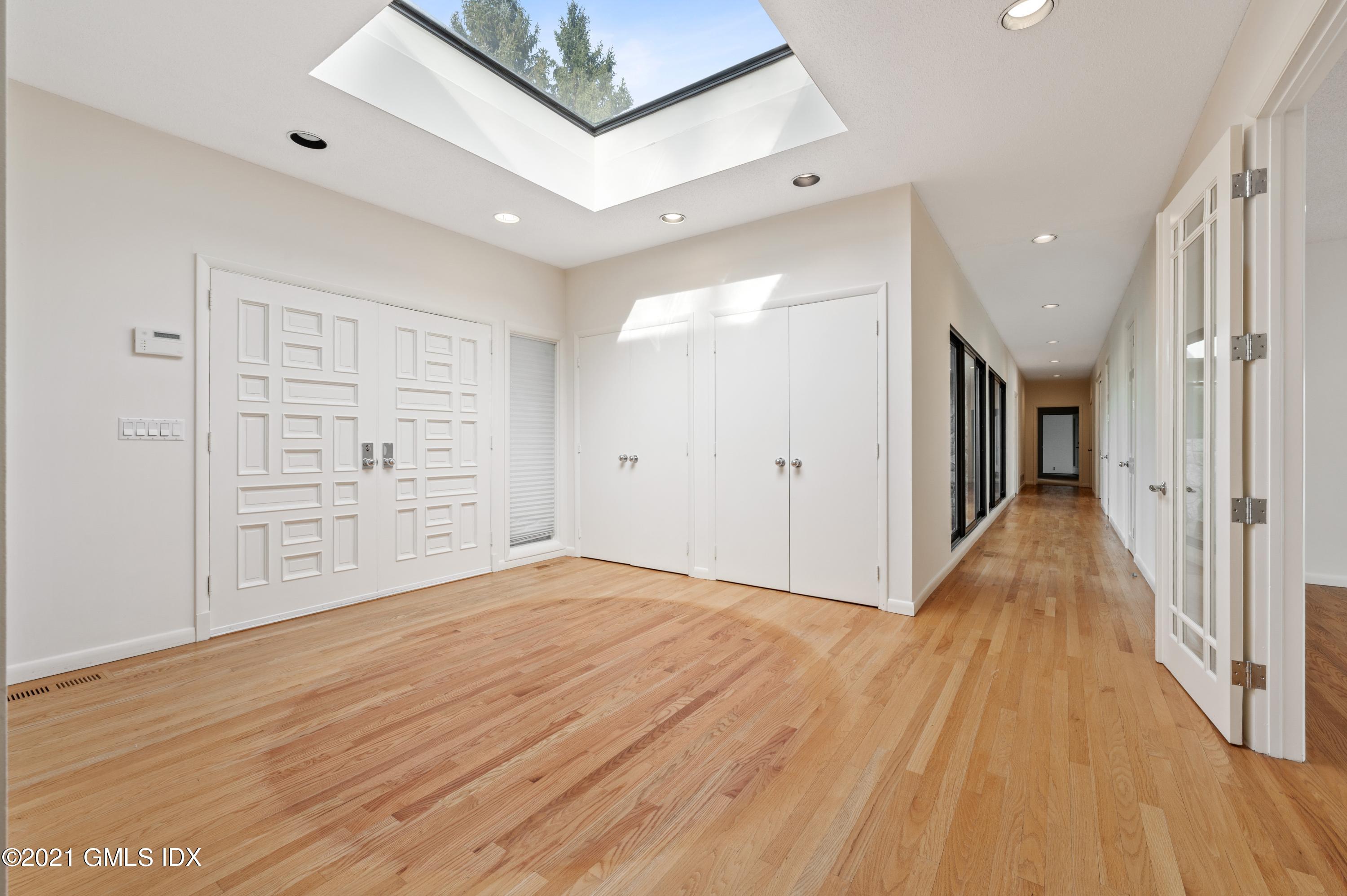 39 Cliffdale Road Greenwich, CT 06831 - Photo 4 of 25 a view of empty room with wooden floor