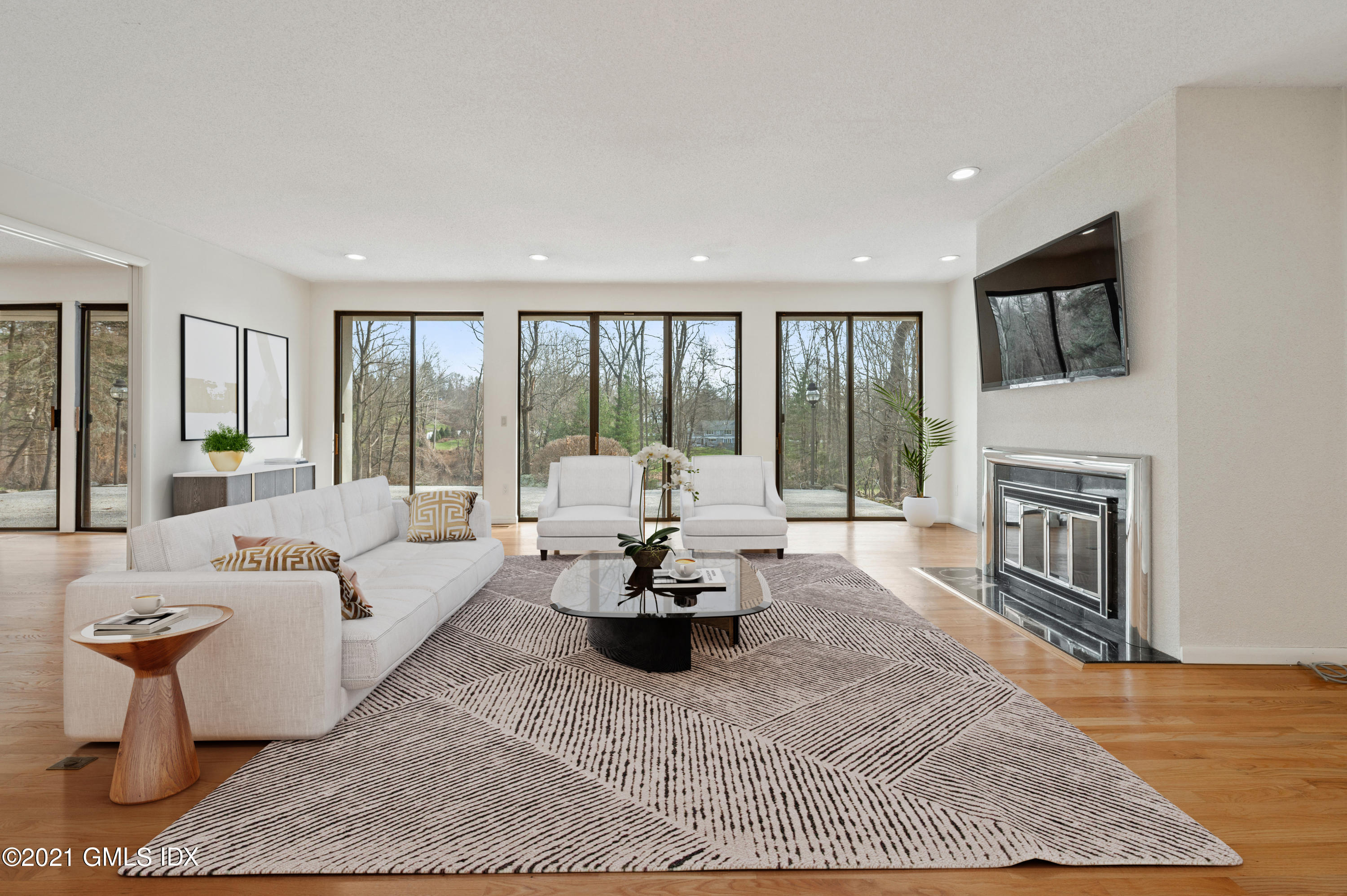 39 Cliffdale Road Greenwich, CT 06831 - Photo 5 of 25 a living room with fireplace furniture and a fireplace