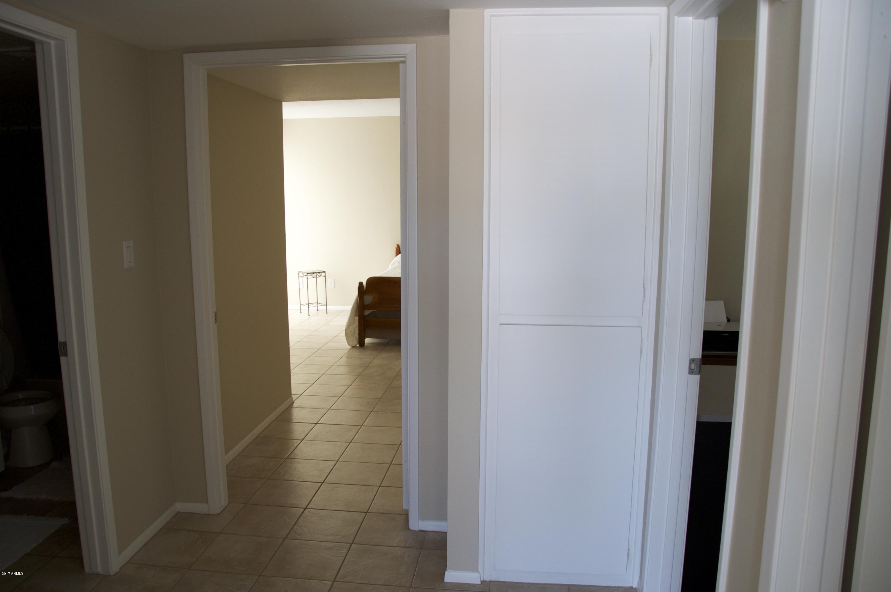 4141 West Hearn Road Phoenix, AZ 85053 - Photo 23 of 42 Built in storage in hallway