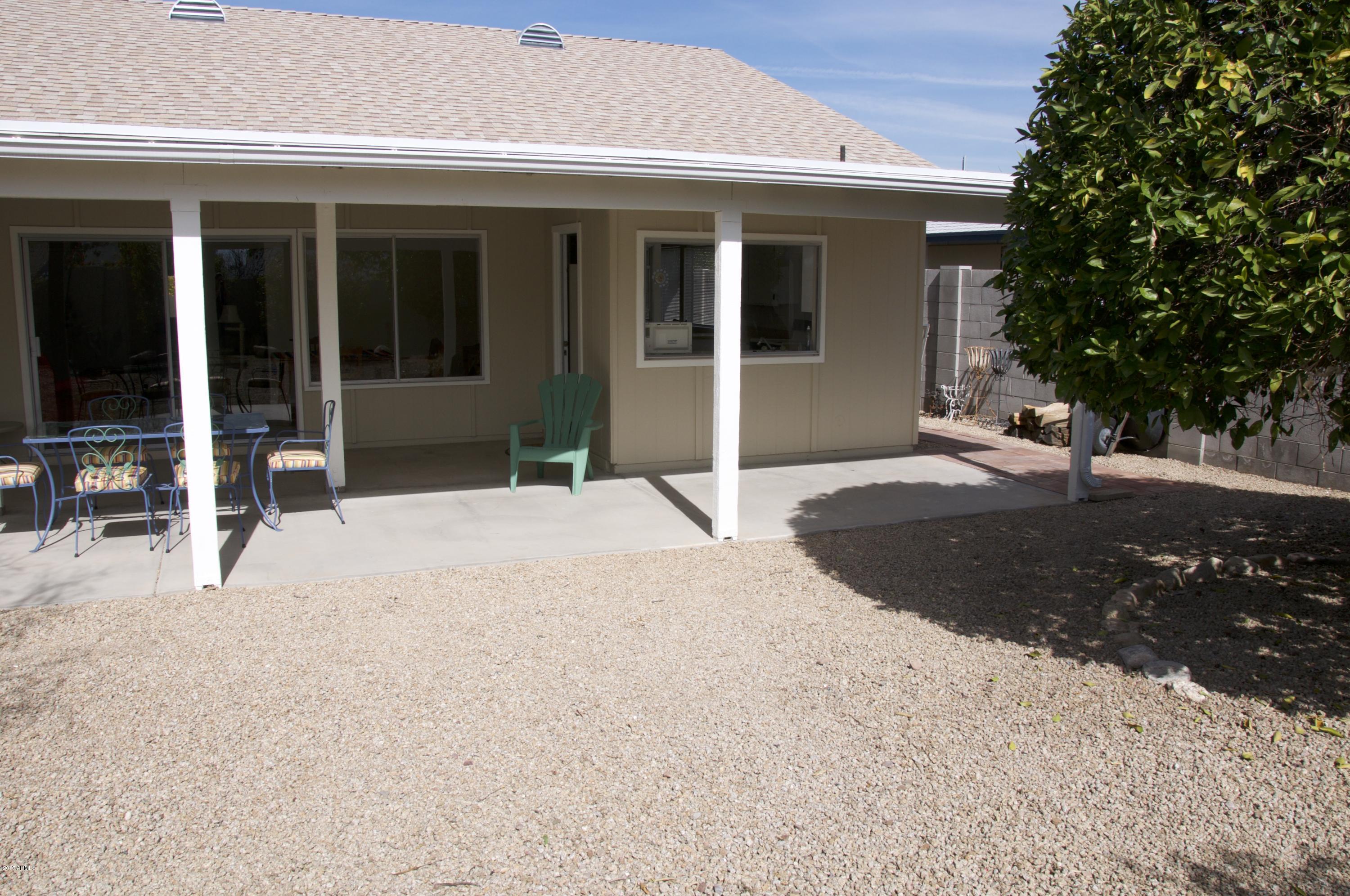 4141 West Hearn Road Phoenix, AZ 85053 - Photo 36 of 42 Citrus tree on the east side of the yard