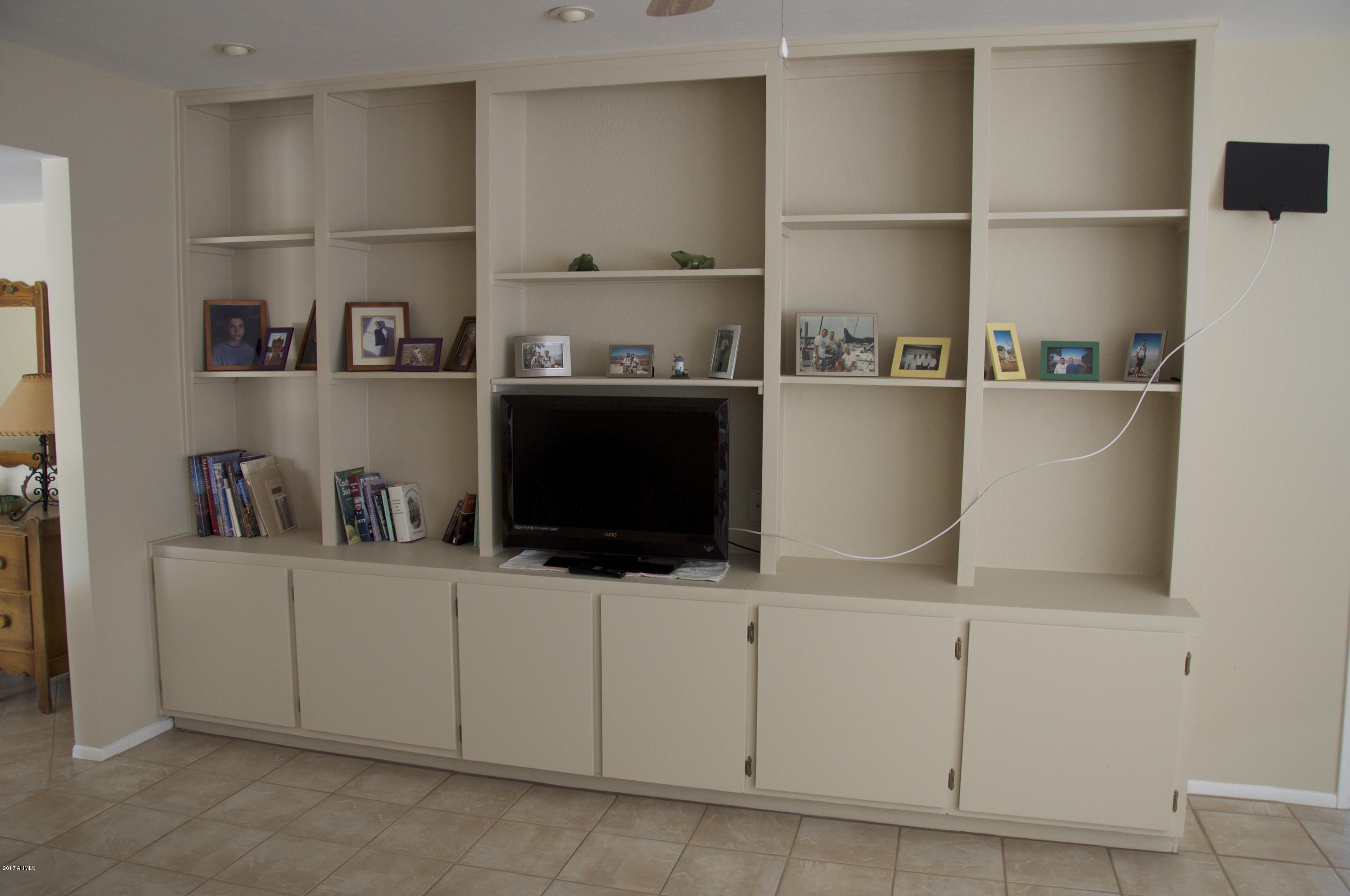 4141 West Hearn Road Phoenix, AZ 85053 - Photo 10 of 42 Built in cabinets in Family Room