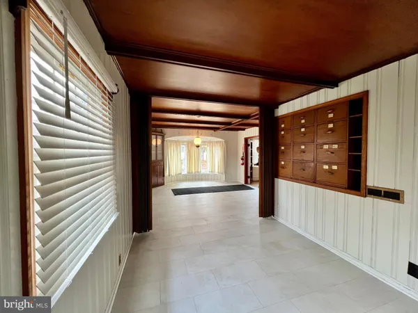 a view of gallery with windows