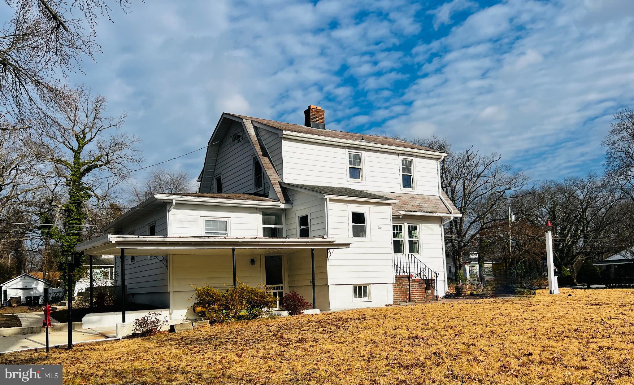 222 Berlin Road North Lindenwold, NJ 08021 - Photo 4 of 7 a view of a house with a yard