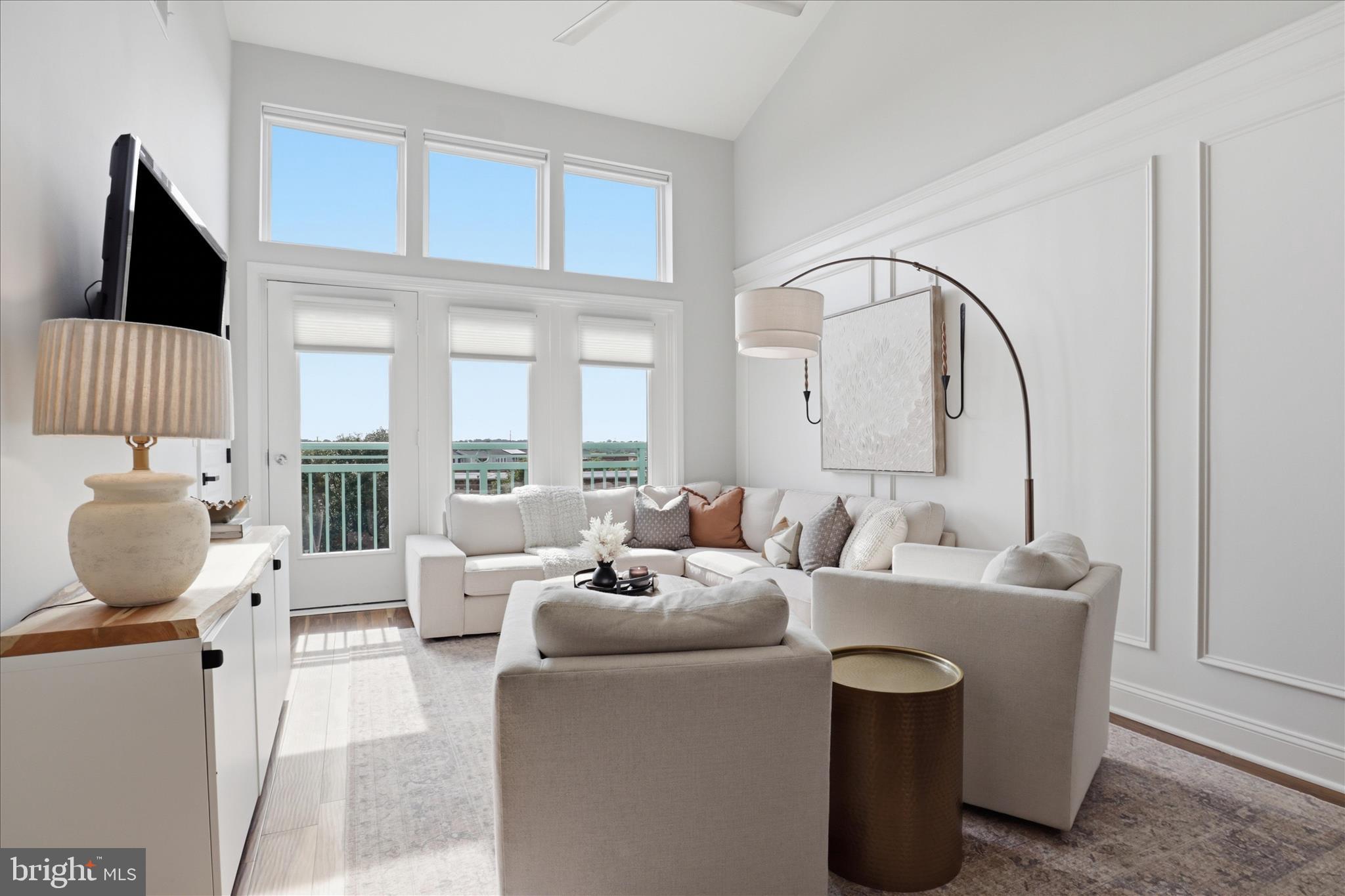 12000 Market Street, Unit 488 Reston, VA 20190 - Photo 12 of 49 LIVING ROOM vaulted ceilings and natural light