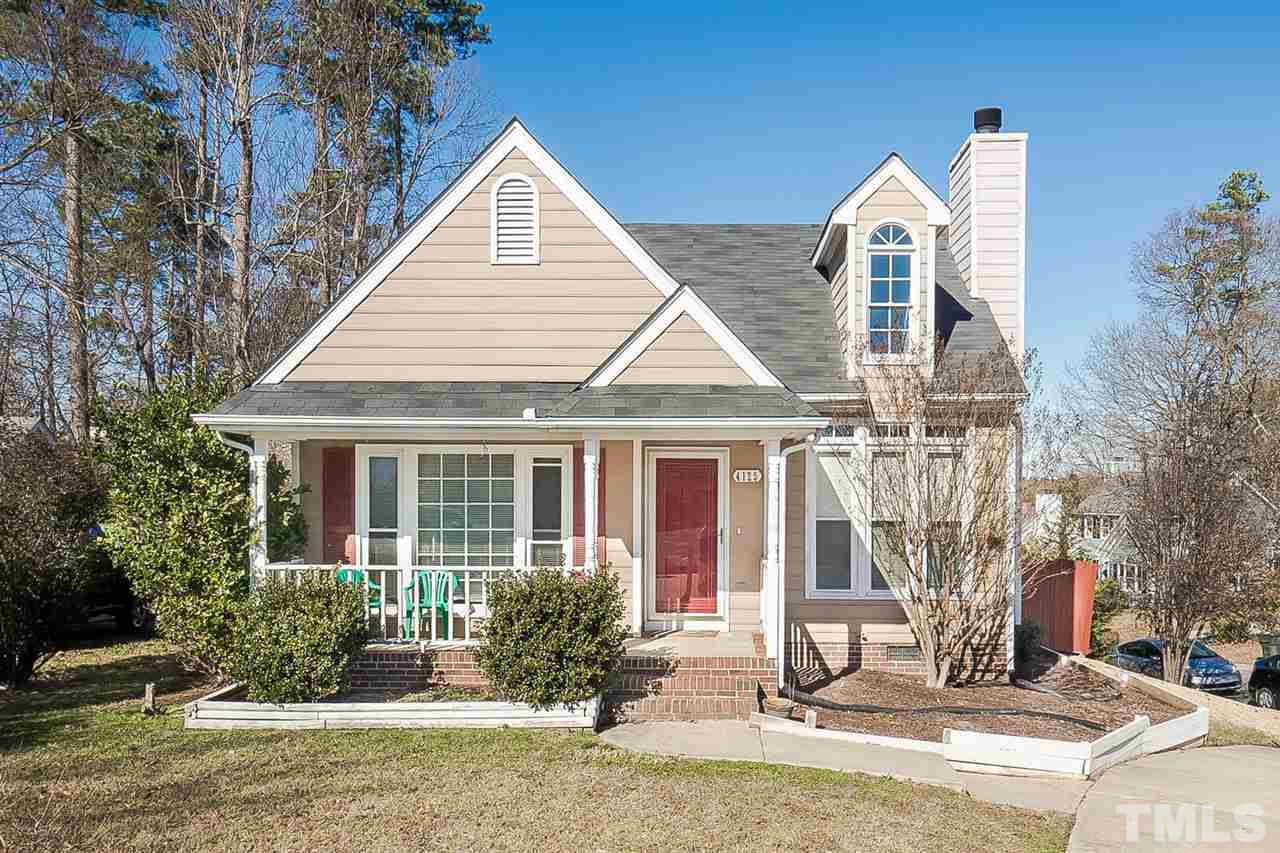 4125 Cobble Court Raleigh, NC 27616 - Photo 1 of 13 a front view of a house with garden
