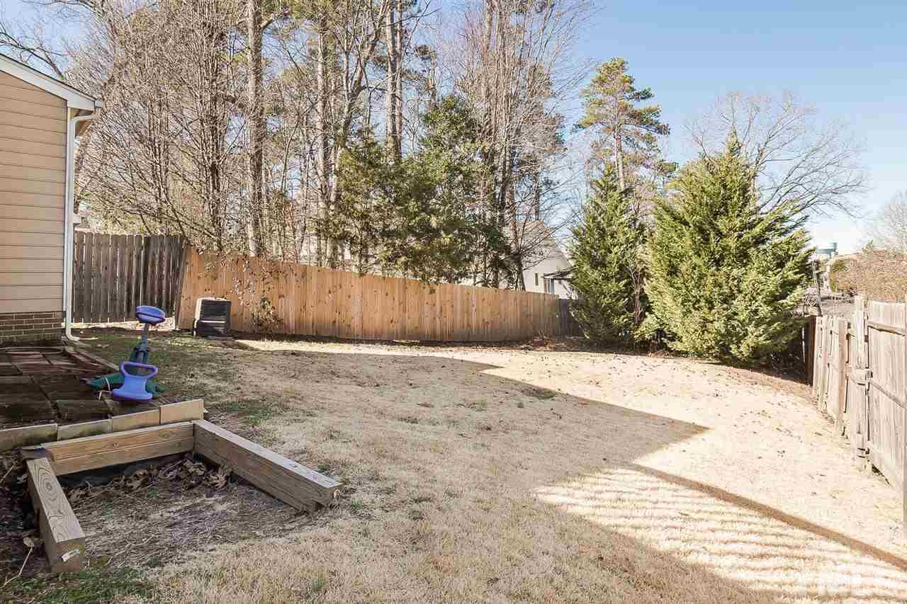 4125 Cobble Court Raleigh, NC 27616 - Photo 13 of 13 a backyard of a house