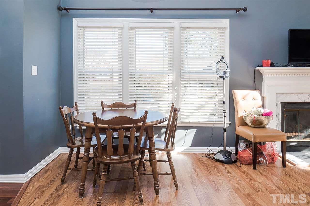 4125 Cobble Court Raleigh, NC 27616 - Photo 4 of 13 a view of a dining room with furniture and a window