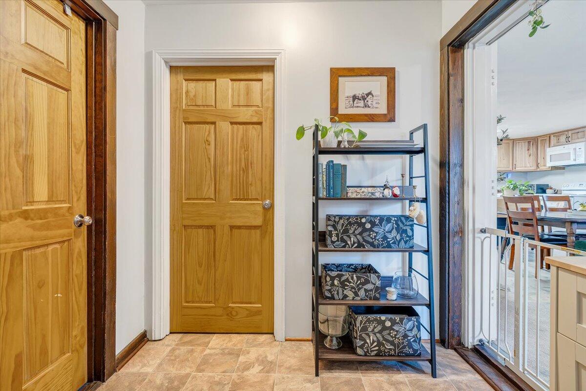 7346 Old Mill Road Roanoke, VA 24018 - Photo 18 of 48 a view of a bedroom with furniture and front door