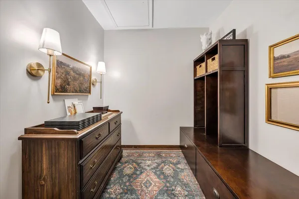 a bedroom with bed and a window