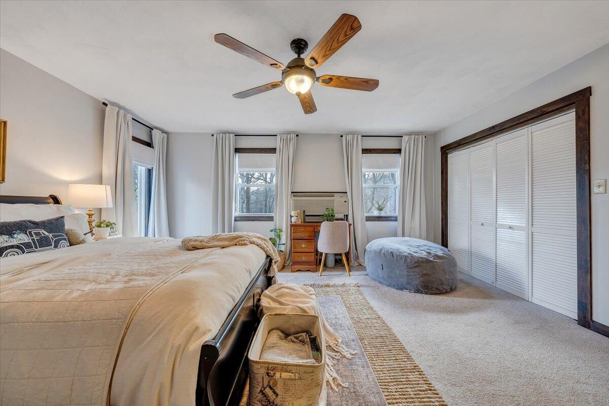 7346 Old Mill Road Roanoke, VA 24018 - Photo 20 of 48 a bed room with a bed and a large window