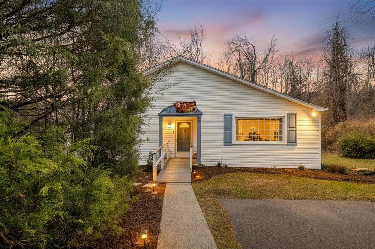 7346 Old Mill Road Roanoke, VA 24018 - Photo 2 of 48 a view of a house with backyard and trees