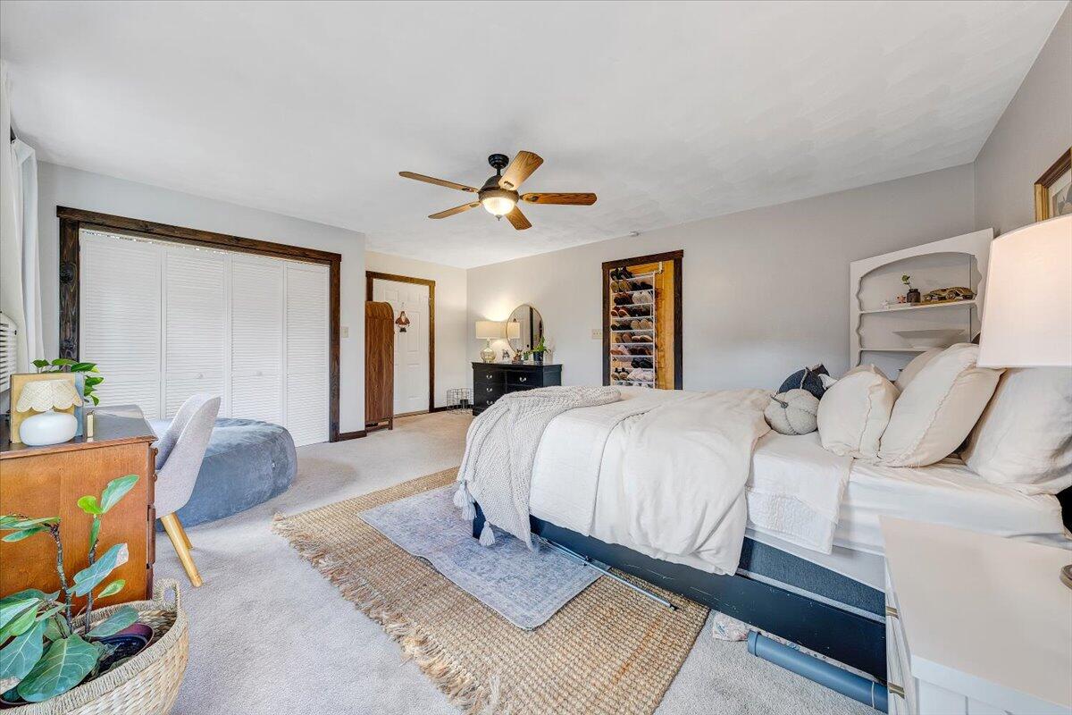 7346 Old Mill Road Roanoke, VA 24018 - Photo 23 of 48 a spacious bedroom with a bed and ceiling fan