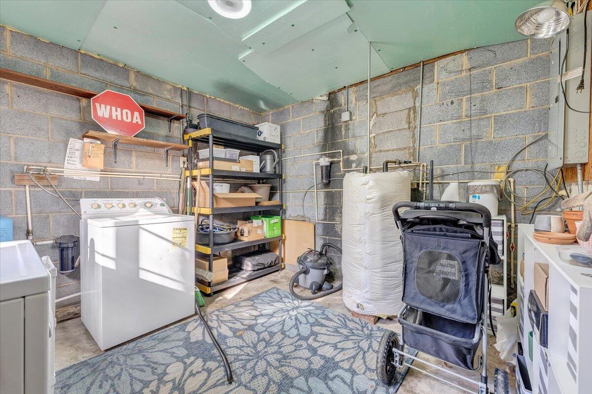 7346 Old Mill Road Roanoke, VA 24018 - Photo 27 of 48 a storage room with washer and dryer