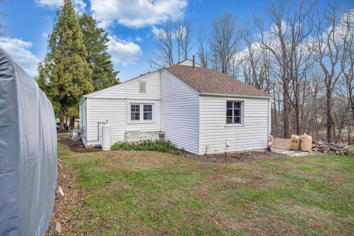 7346 Old Mill Road Roanoke, VA 24018 - Photo 30 of 48 a view of a backyard with plants and large tree