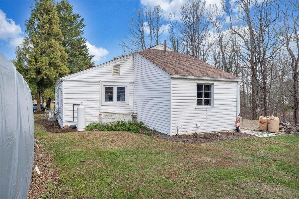 7346 Old Mill Road Roanoke, VA 24018 - Photo 31 of 48 a view of a house with a yard