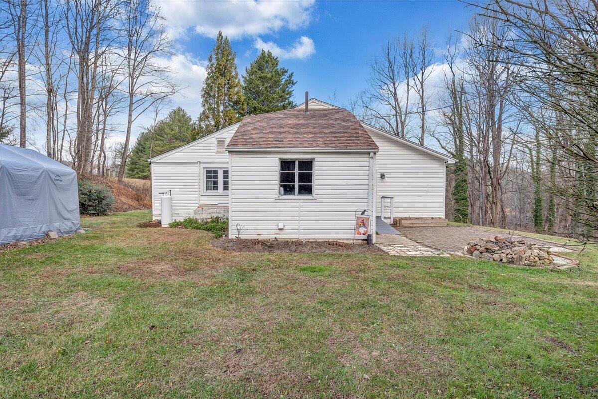 7346 Old Mill Road Roanoke, VA 24018 - Photo 33 of 48 a view of a house with a yard