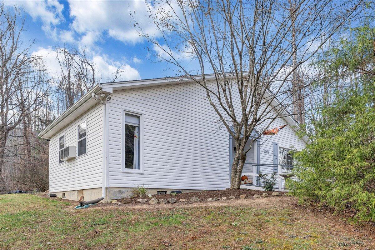 7346 Old Mill Road Roanoke, VA 24018 - Photo 39 of 48 a view of a house with a yard and tree