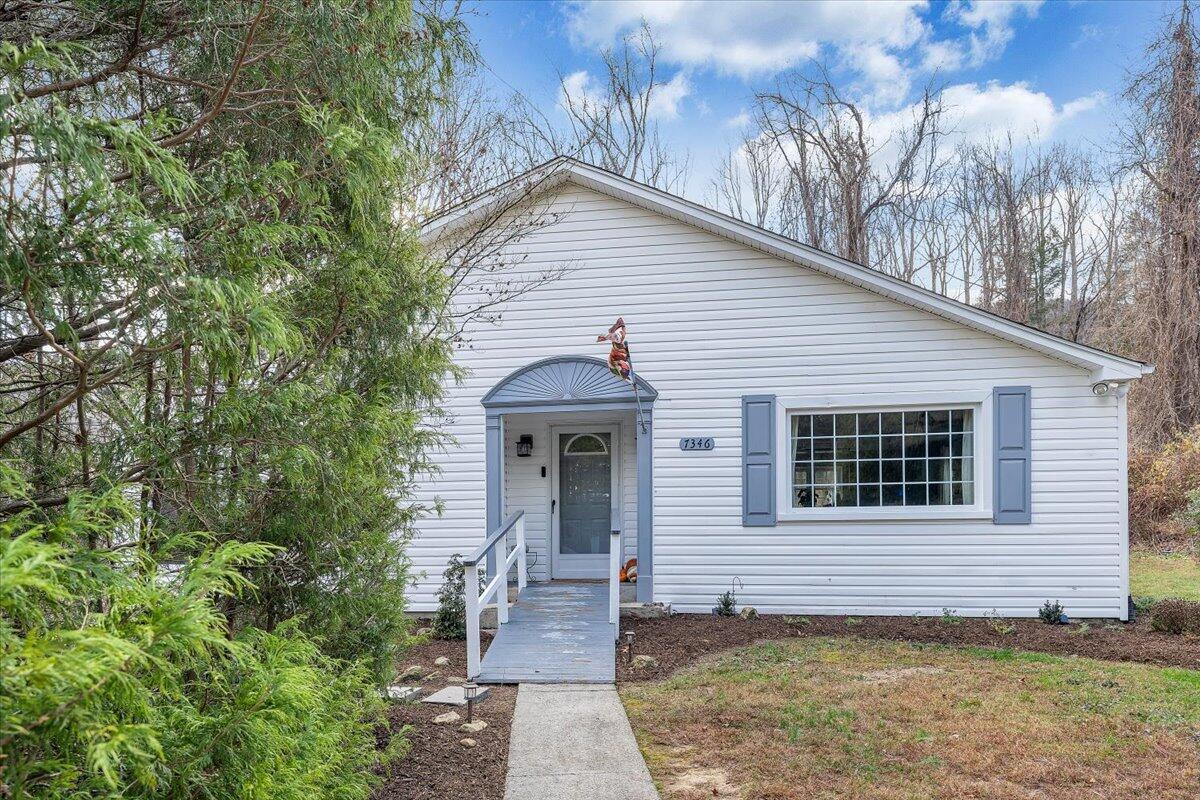 7346 Old Mill Road Roanoke, VA 24018 - Photo 42 of 48 a view of a house with a yard
