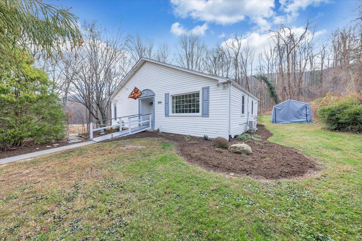 7346 Old Mill Road Roanoke, VA 24018 - Photo 45 of 48 a view of a house with a yard