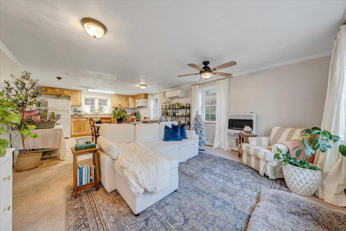 7346 Old Mill Road Roanoke, VA 24018 - Photo 5 of 48 a living room with furniture and a chandelier