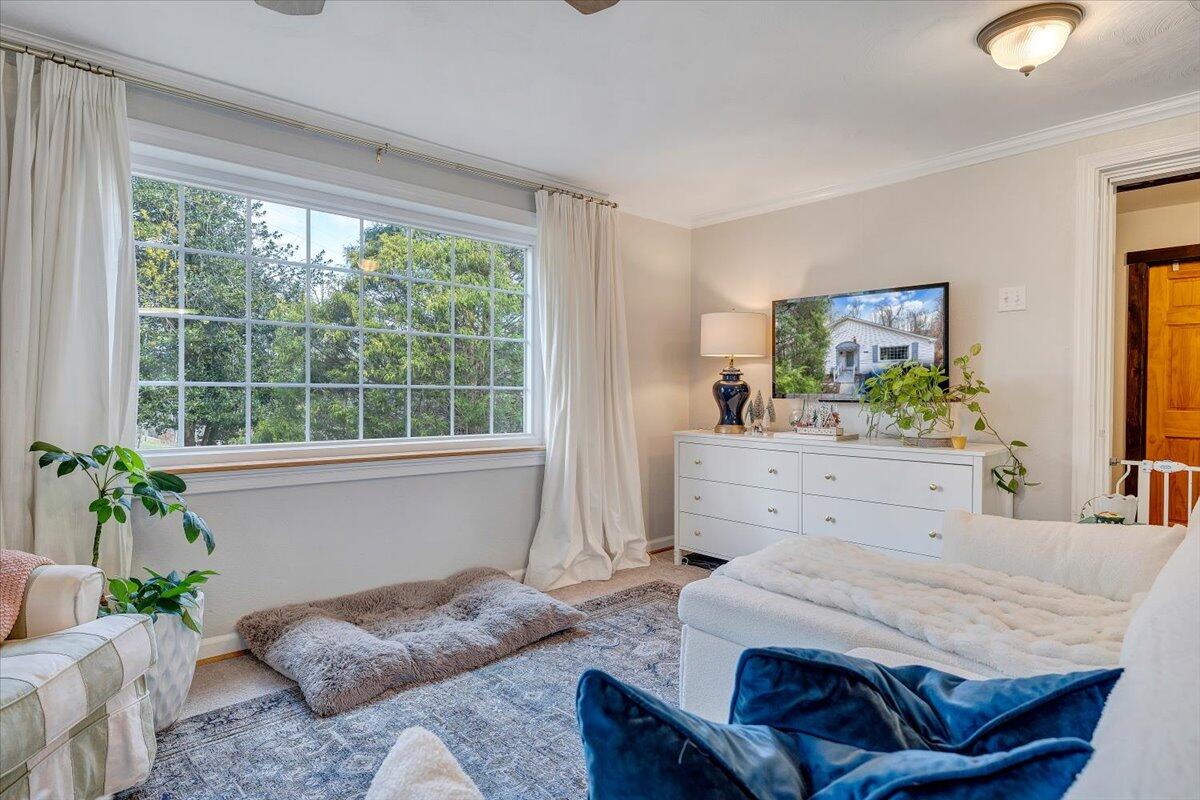 7346 Old Mill Road Roanoke, VA 24018 - Photo 7 of 48 a bedroom with a bed and large windows