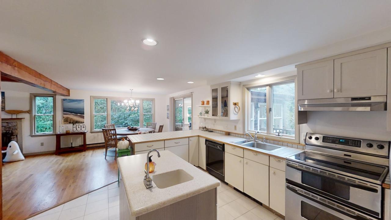 30 Captain Penniman Road Eastham, MA 02642 - Photo 8 of 25 kitchen out to DR