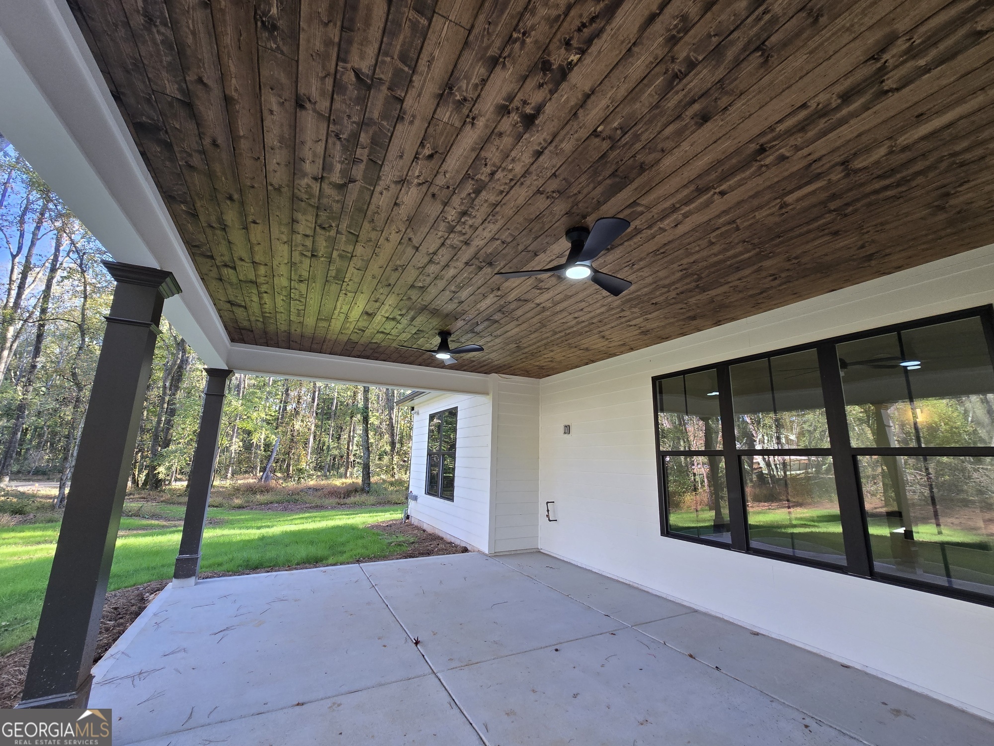 2043 Fischer Road Sharpsburg, GA 30277 - Photo 24 of 51 a view of a porch with a backyard