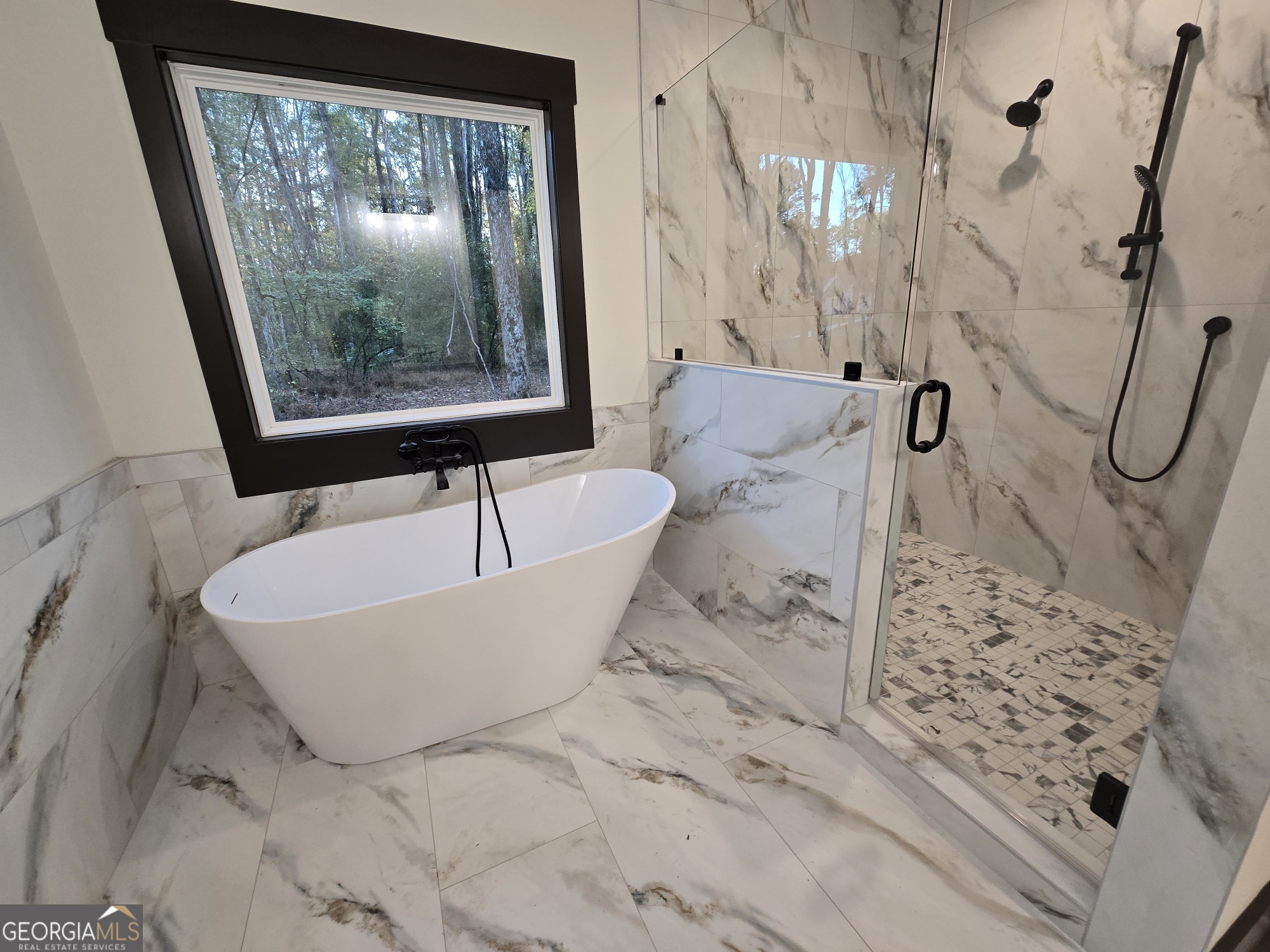 2043 Fischer Road Sharpsburg, GA 30277 - Photo 29 of 51 a white bath tub sitting next to a window