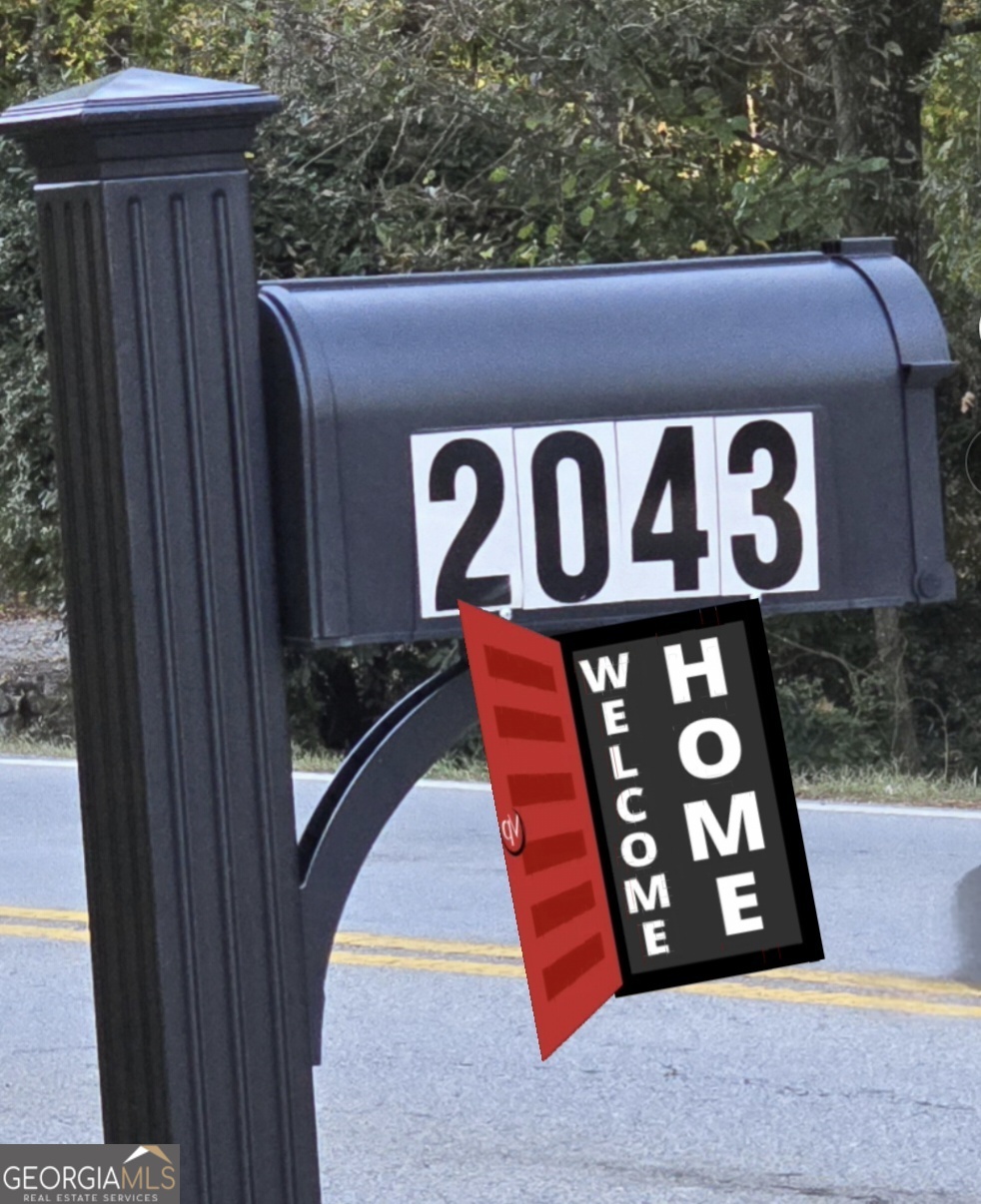 2043 Fischer Road Sharpsburg, GA 30277 - Photo 51 of 51 a view of a wooden sign board